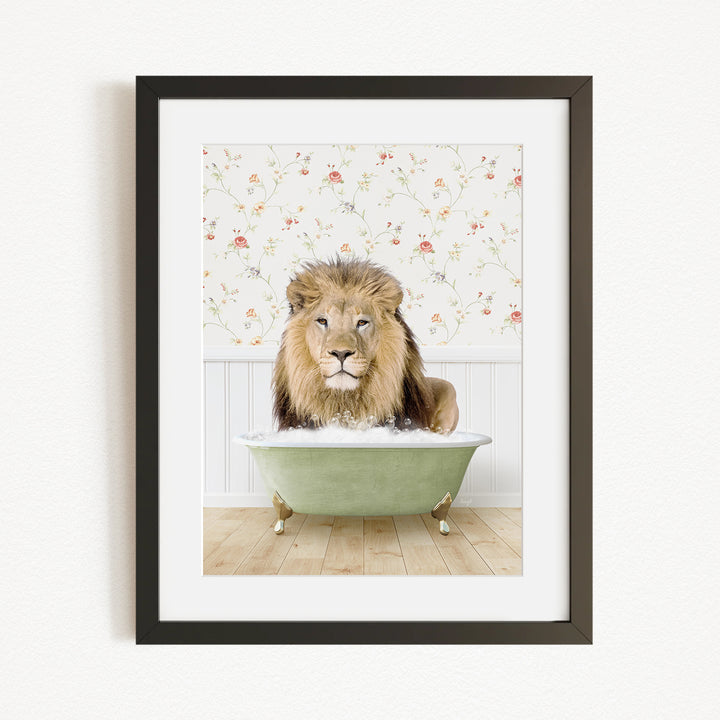 A lion sitting in a green bathtub, surrounded by a floral patterned wall.