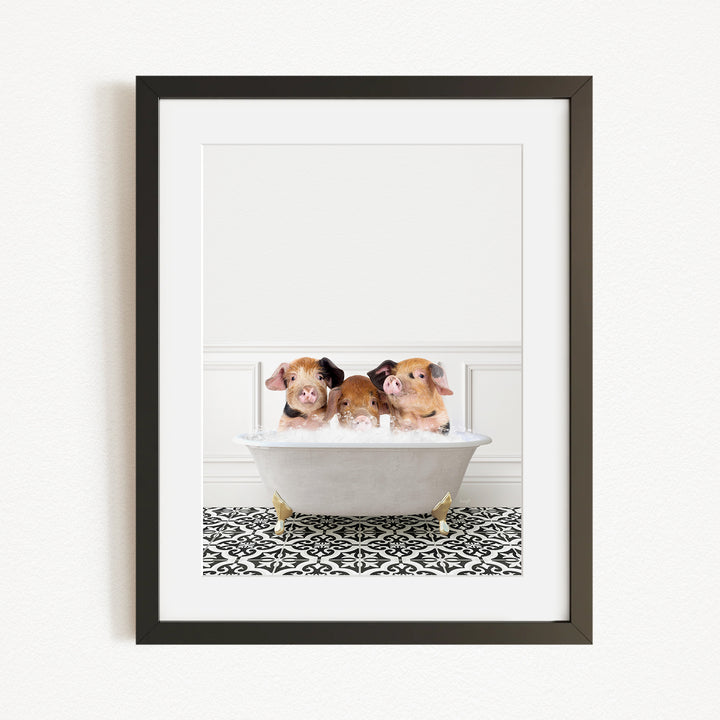 Three adorable pigs sitting in a white bathtub, enjoying a relaxing bath.