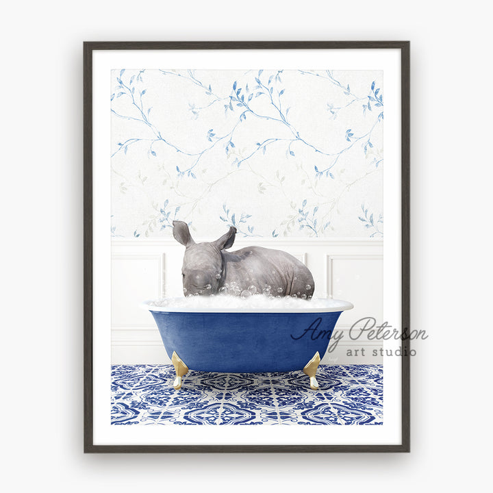 a rhinoceros in a bathtub with a wallpaper behind it