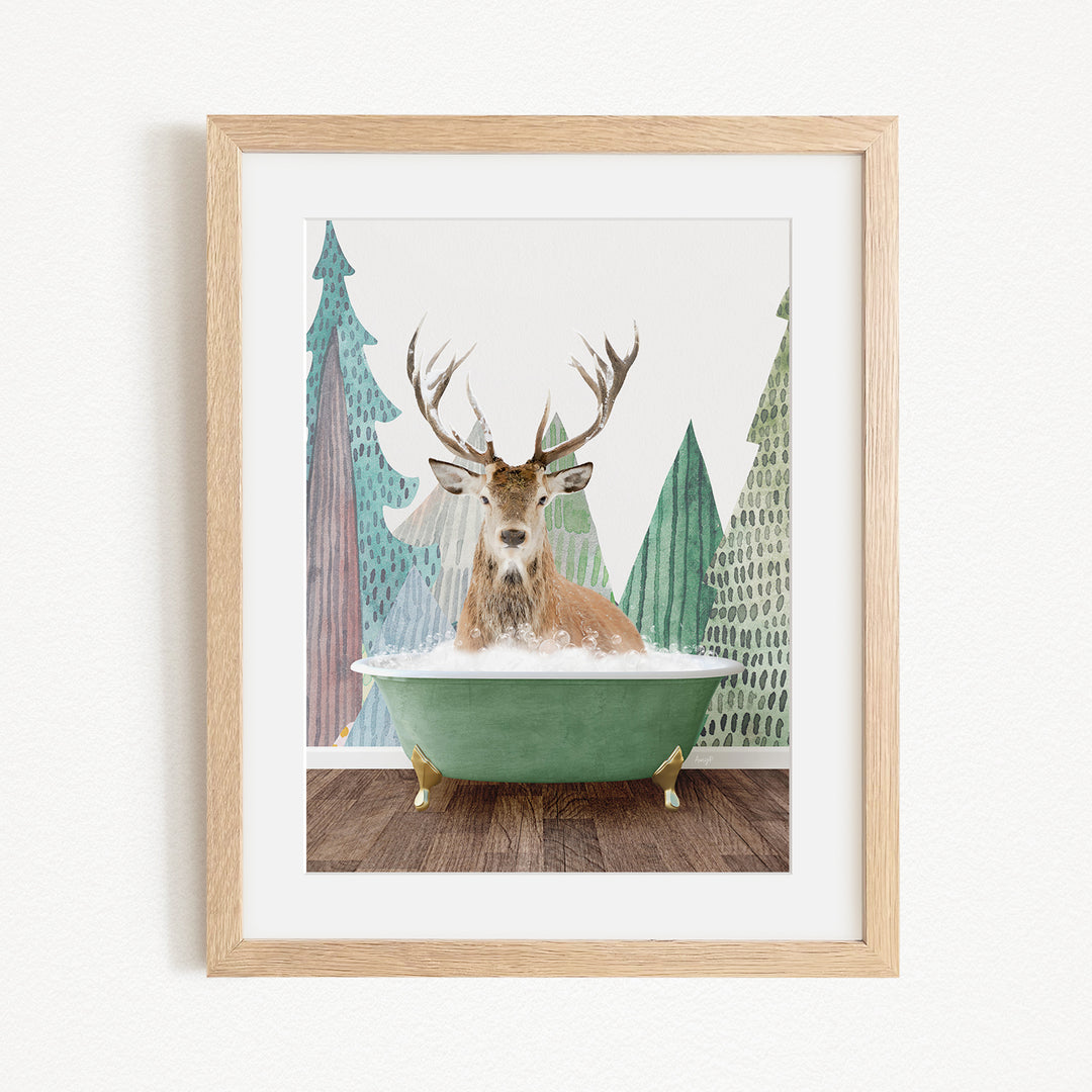 A deer with antlers is sitting in a green bathtub, surrounded by a forest scene with trees and a snowy landscape.