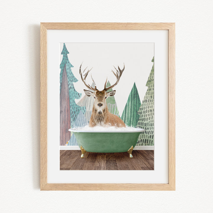 A deer with antlers is sitting in a green bathtub, surrounded by a forest scene with trees and a snowy landscape.