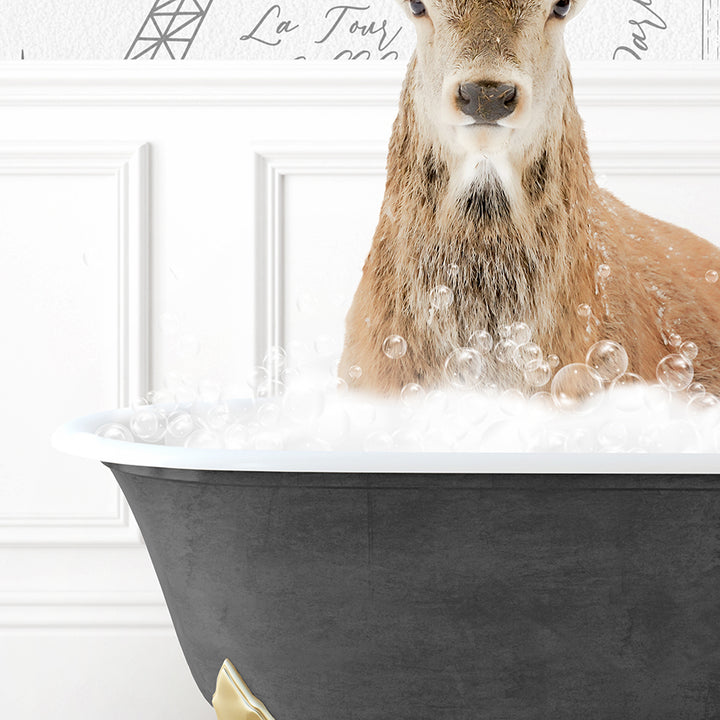 a deer is sitting in a bathtub full of bubbles