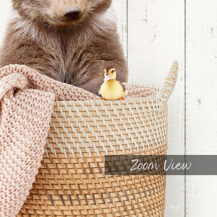 A brown bear and a yellow duck sit together in a woven basket, with the bear's head partially visible.
