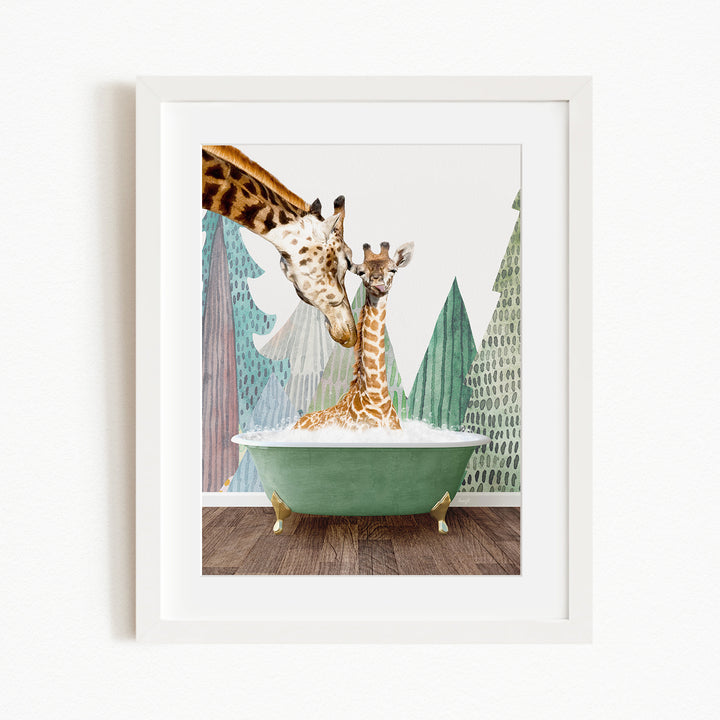 A mother giraffe and her baby giraffe are sitting together in a green bathtub, with the mother gently licking her baby.