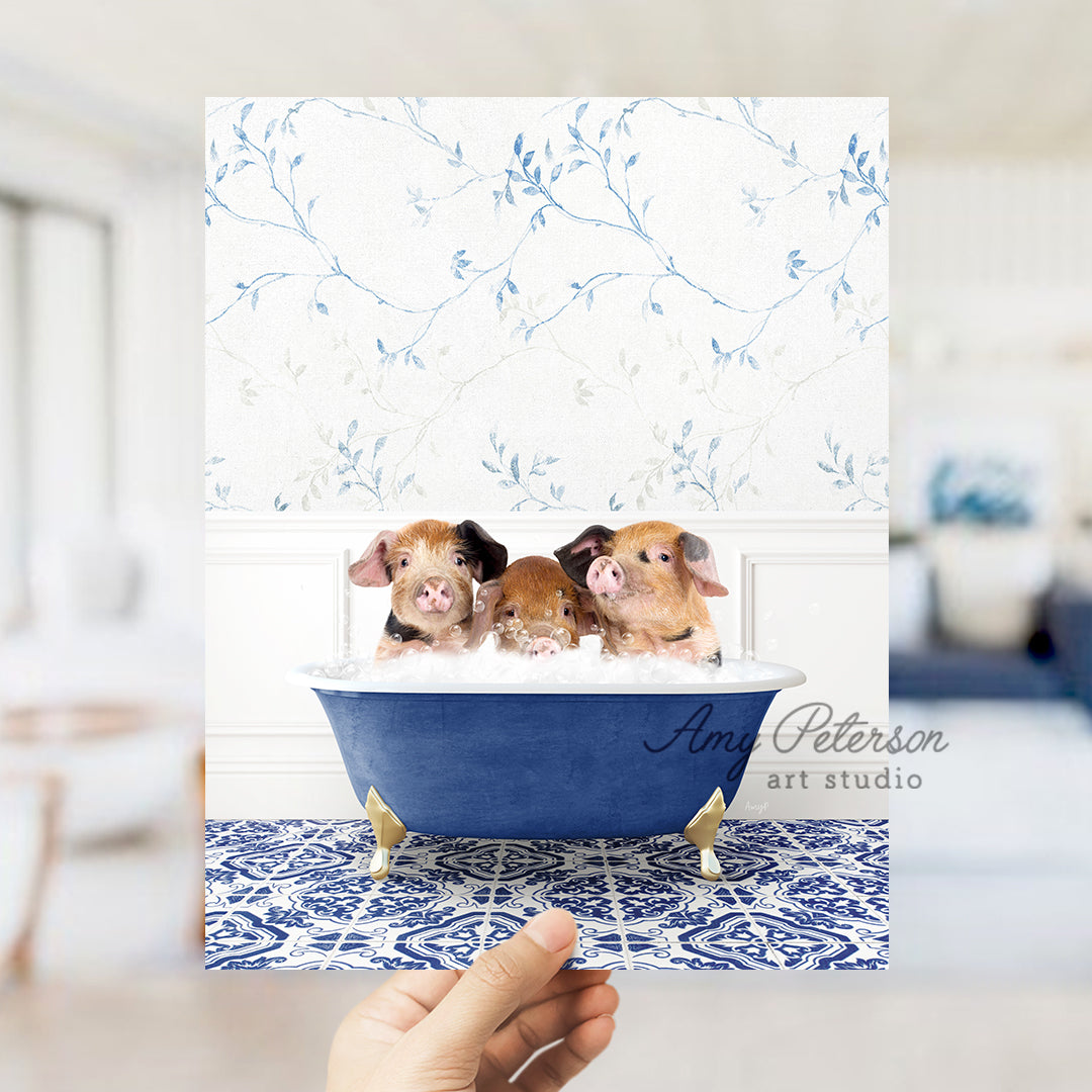 a person holding up a card with two puppies in a bathtub