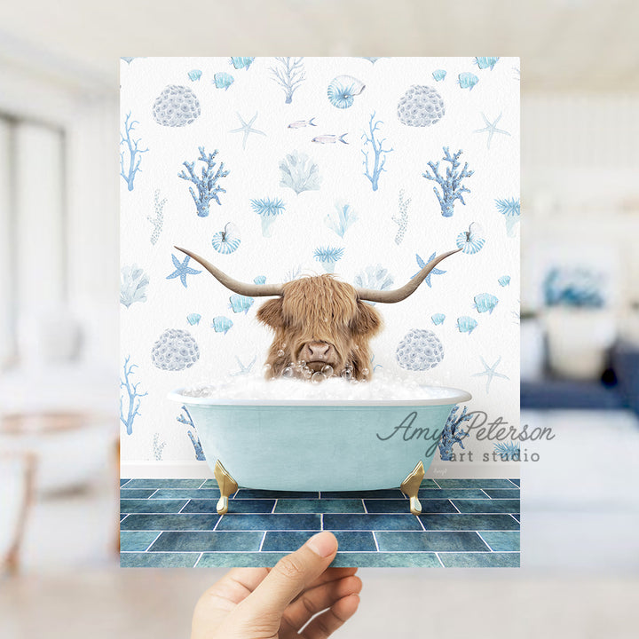 a hand holding up a card with a picture of a bull in a bathtub