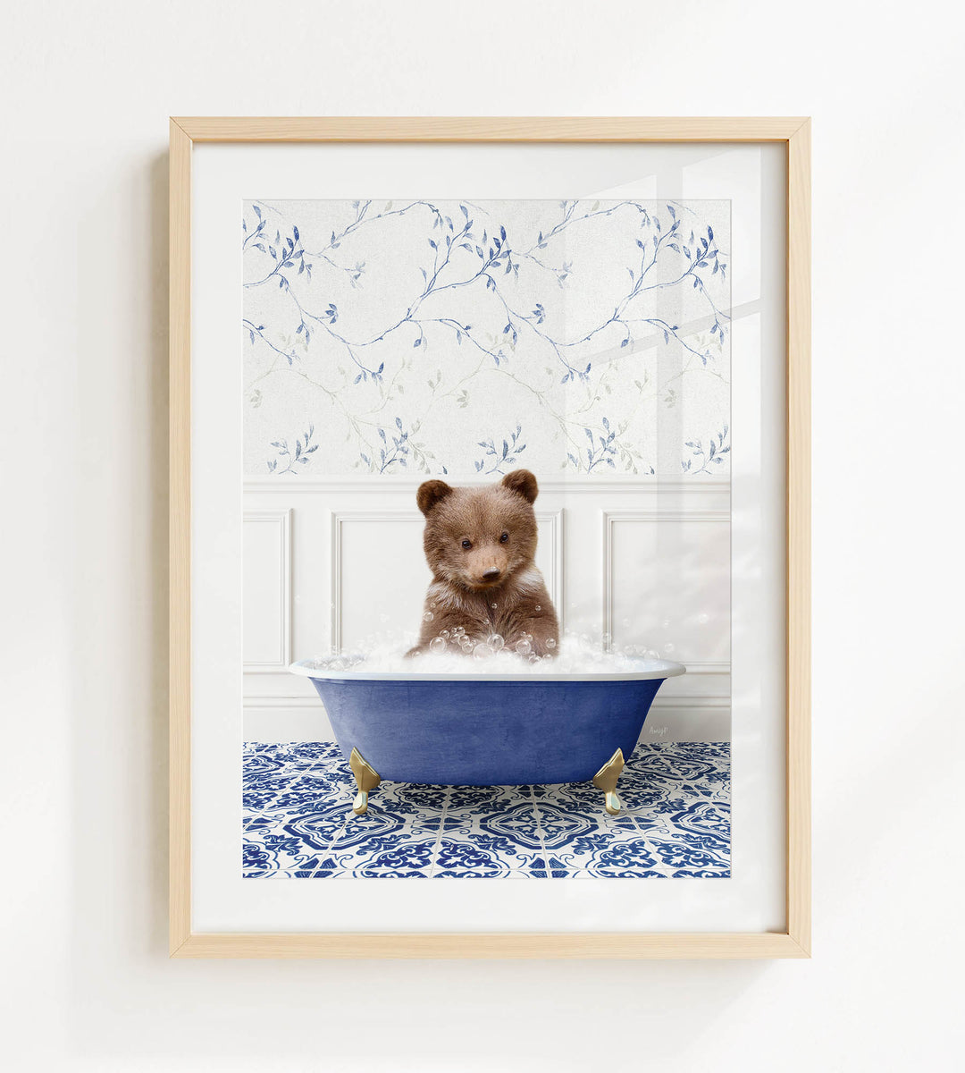 A brown bear sitting in a blue bathtub filled with bubbles, surrounded by a blue and white patterned floor.