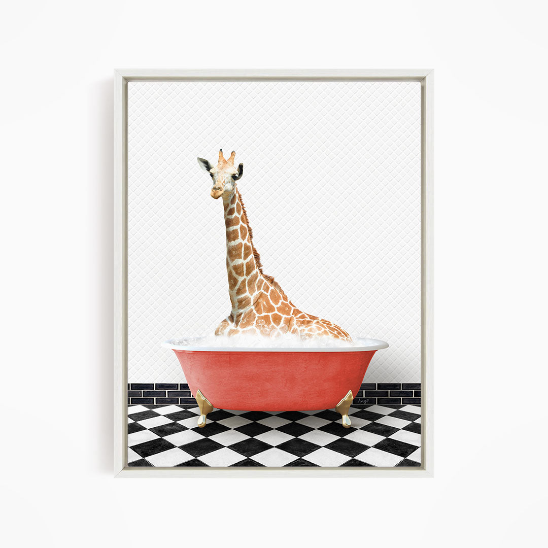 A giraffe sitting in a red bathtub on a black and white checkered floor.