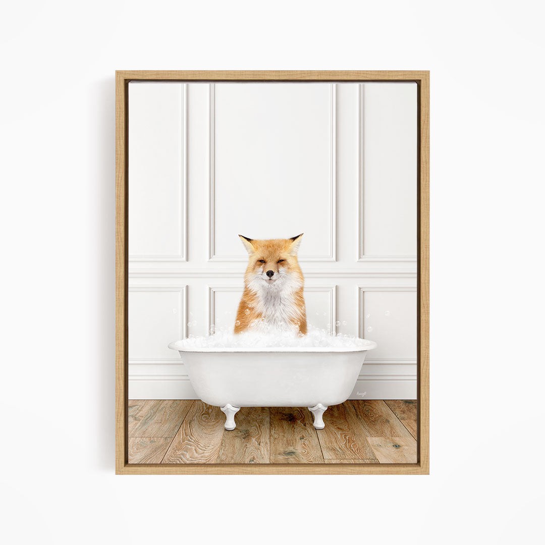 A red fox is sitting in a white bathtub, looking directly at the camera.