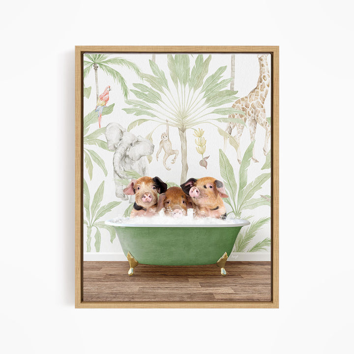A framed print depicting three pigs sitting in a green bathtub, surrounded by a tropical jungle wallpaper with various animals and plants.
