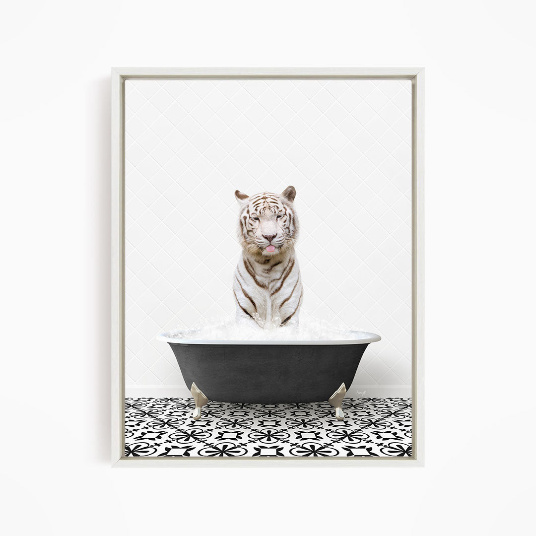 A white tiger sitting in a black bathtub filled with water, with a black and white patterned floor in the foreground.