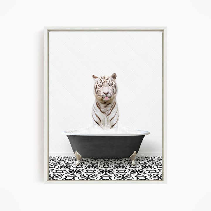 A white tiger sitting in a black bathtub filled with water, with a black and white patterned floor in the foreground.