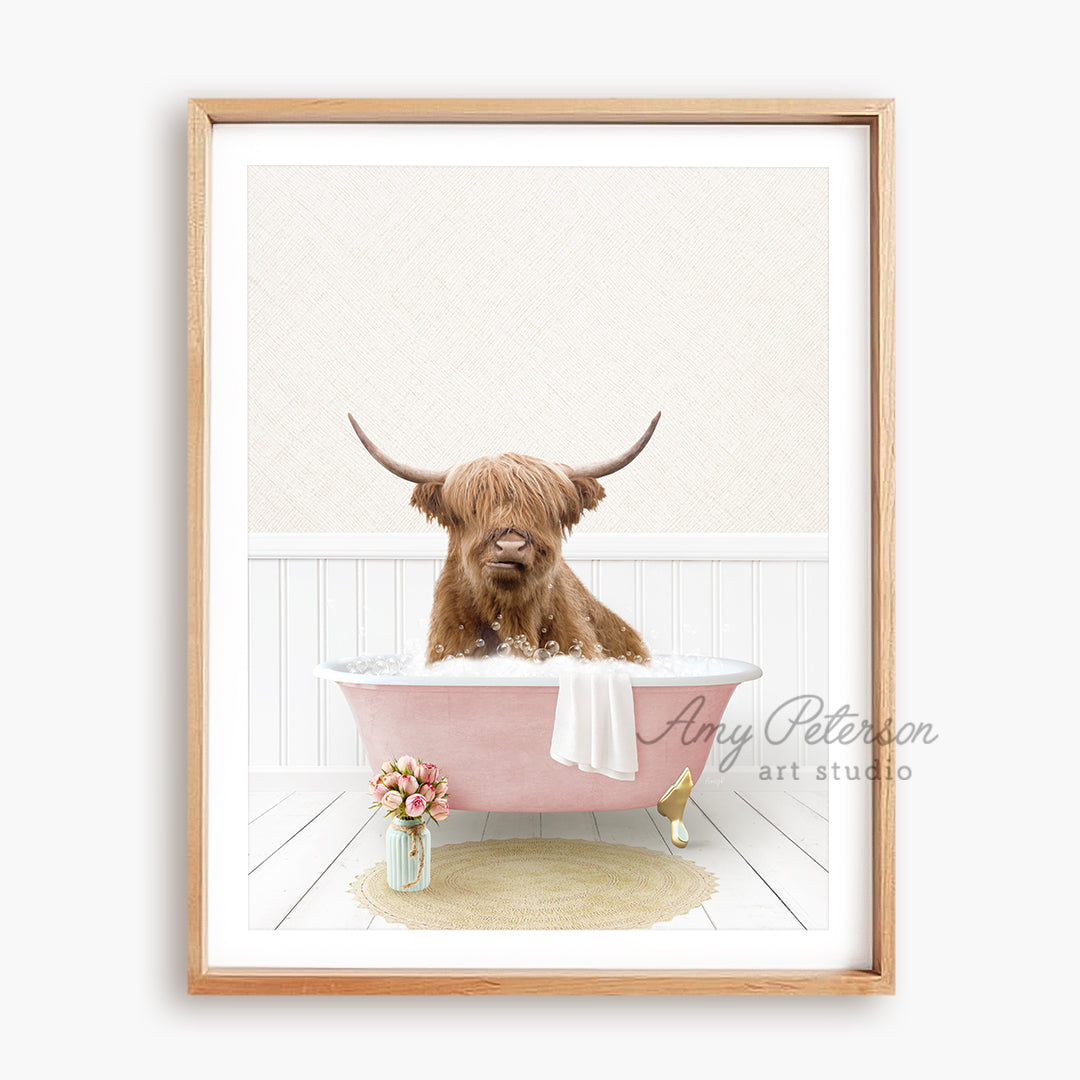 a brown dog sitting in a pink bath tub