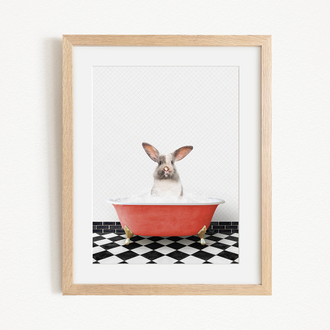 A white rabbit sitting in a red bathtub filled with water, with a black and white checkered floor in the background.