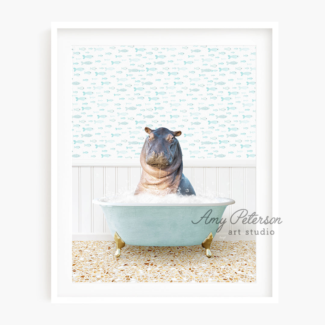 a hippo sitting in a bathtub with its head in the water