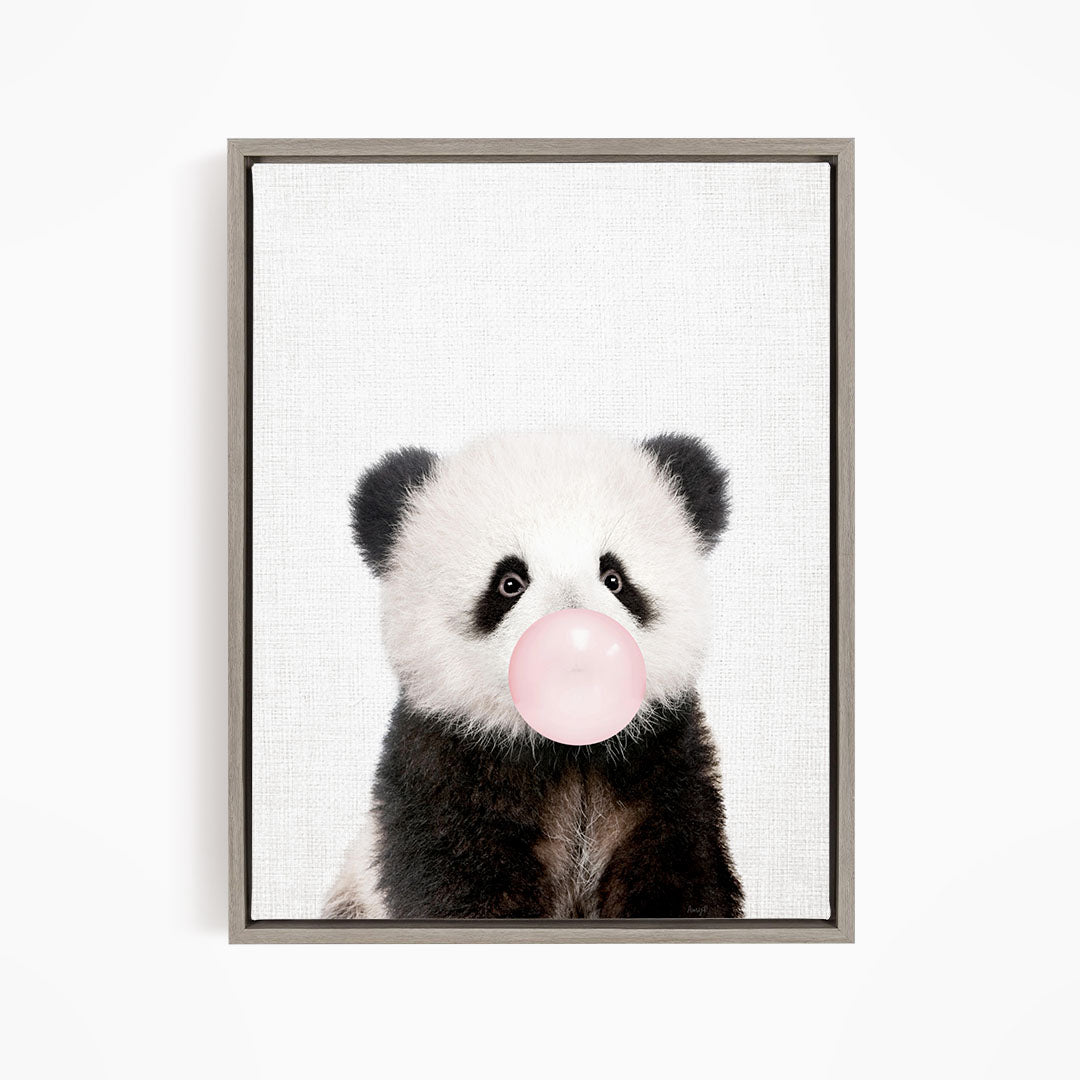 A cute panda bear blowing a bubble with a pink bubble gum bubble.