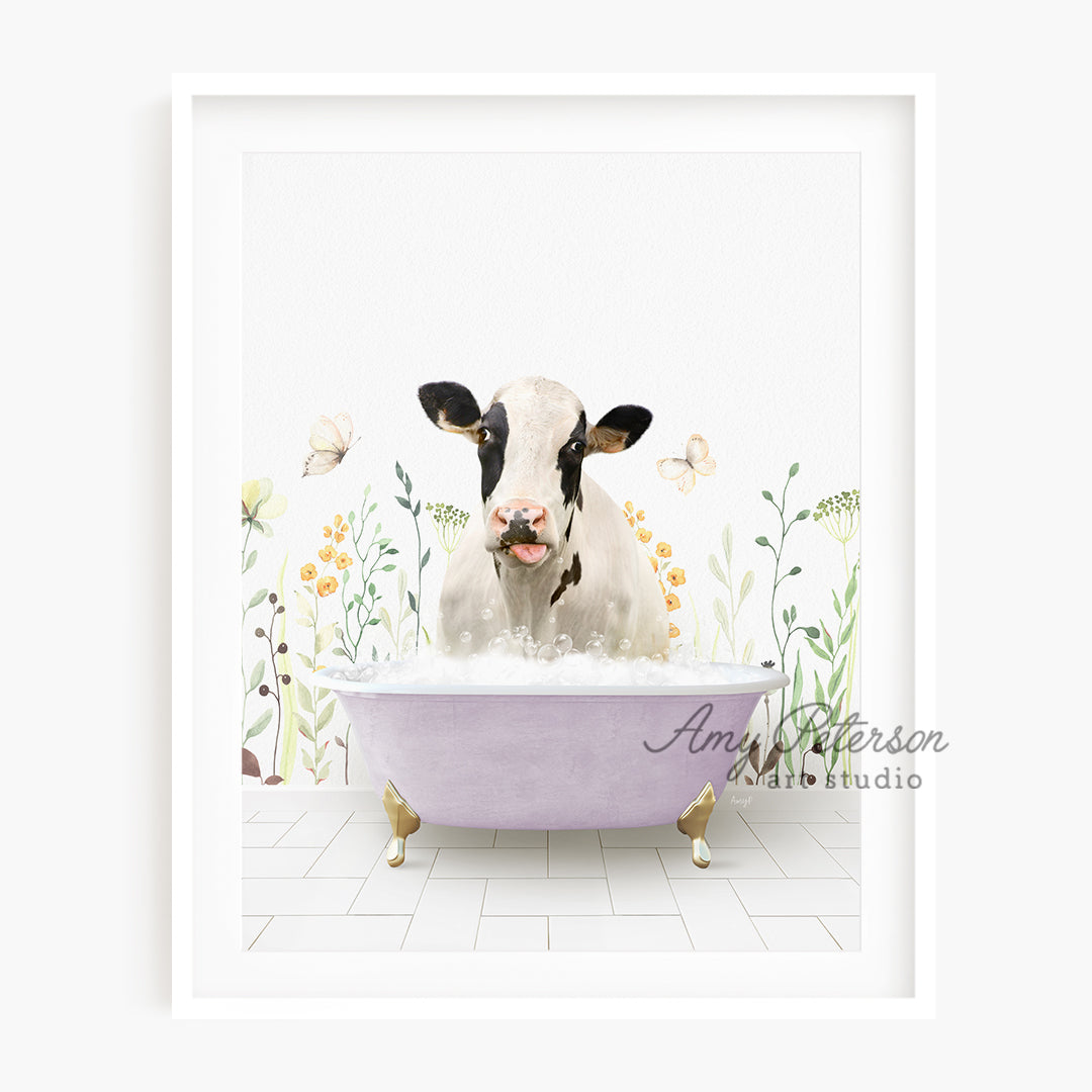 a cow sitting in a bathtub with flowers around it