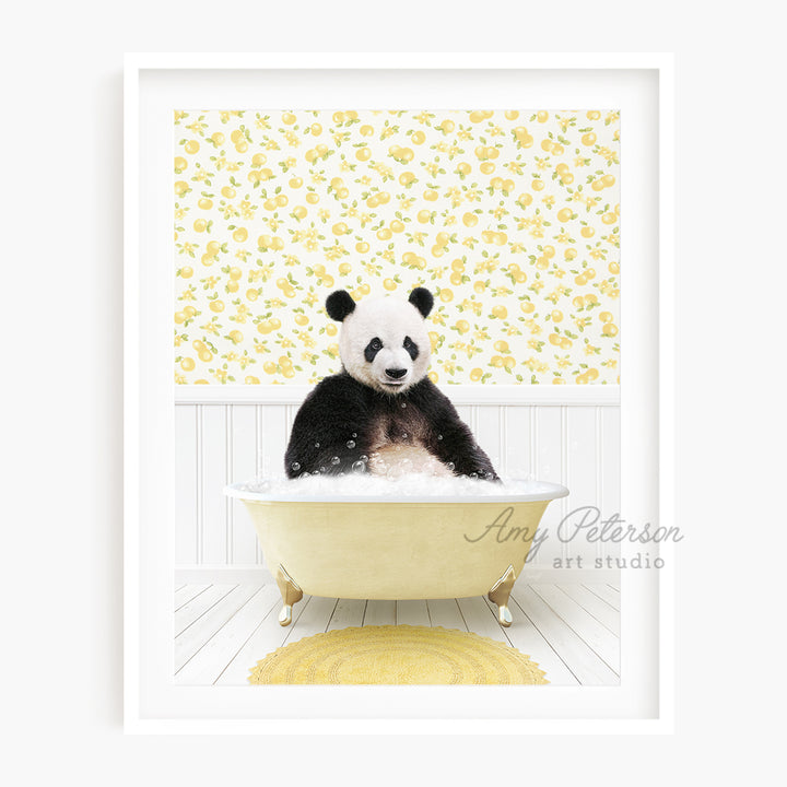 a panda bear sitting in a bath tub