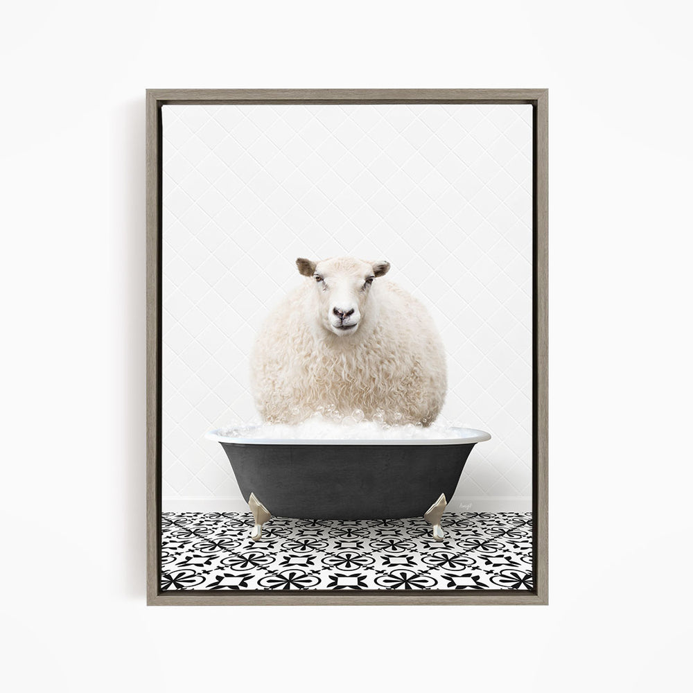 A fluffy white sheep sits in a black bathtub filled with water, creating a whimsical and amusing scene.