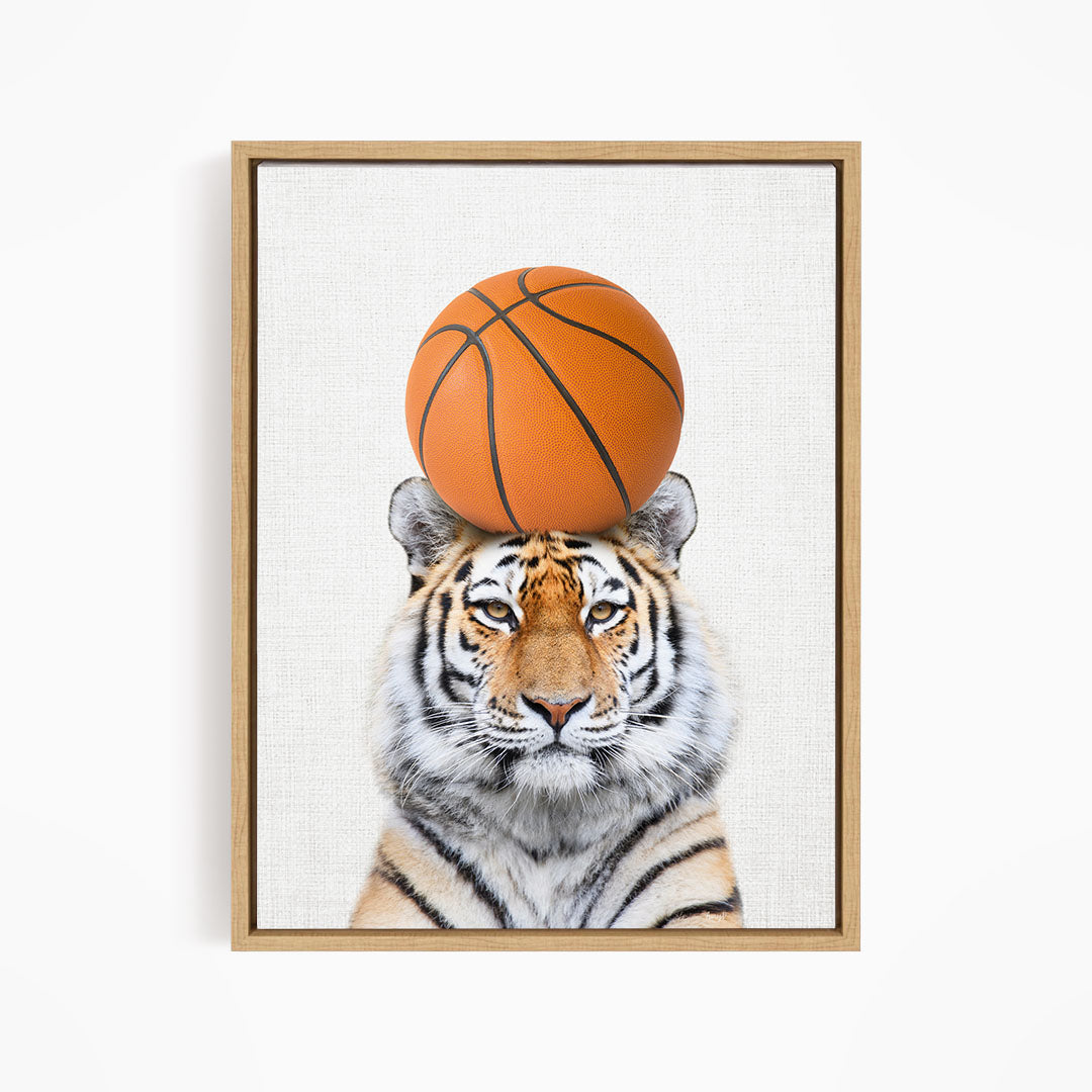 A tiger is depicted balancing a basketball on its head, creating a playful and humorous scene.