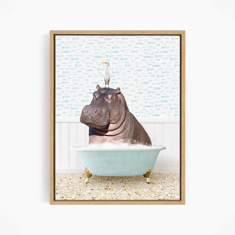 A large hippopotamus is sitting in a bathtub filled with water, with a seagull perched on its head.
