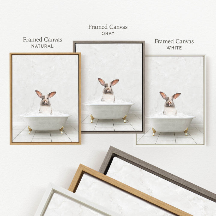 three framed pictures of a rabbit sitting in a bathtub, each with a different colored frame.