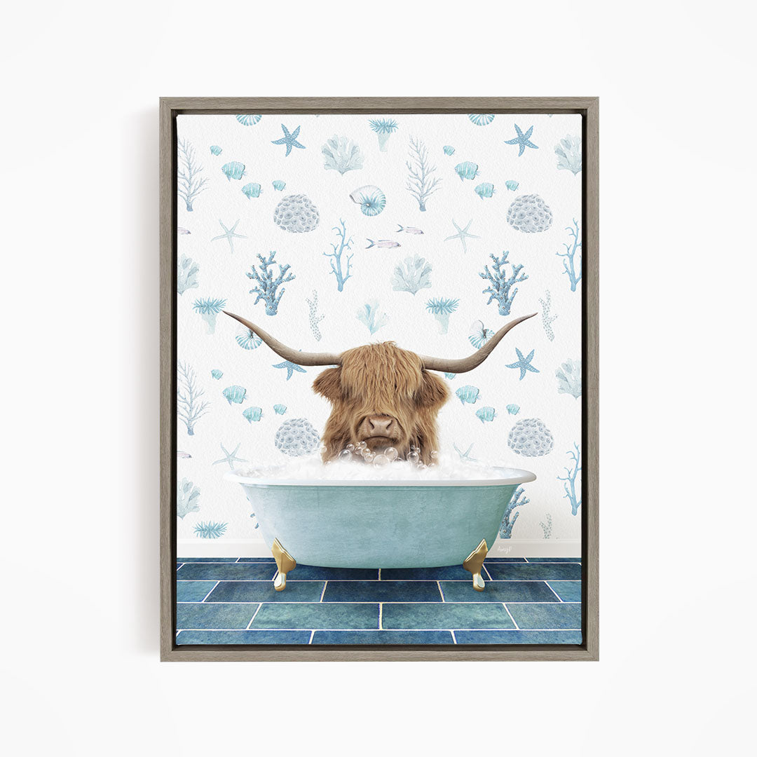 A brown cow with long horns is sitting in a blue bathtub filled with water, surrounded by a pattern of blue and white seashells and starfish.