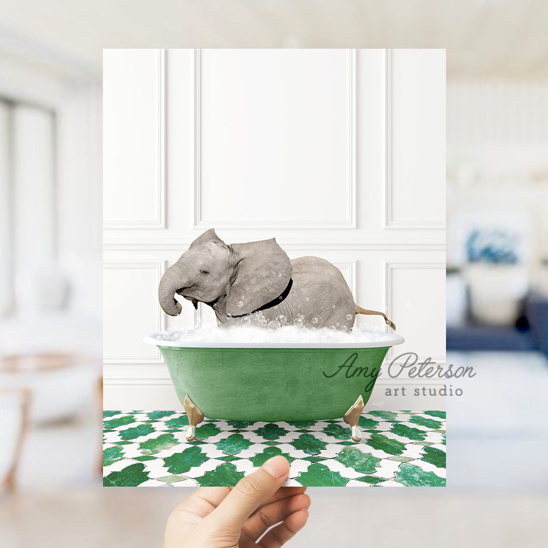 a hand holding a card with an elephant in a bathtub