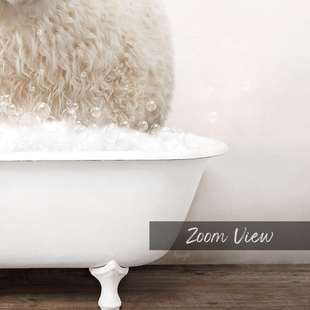 A fluffy white dog is sitting in a white bathtub filled with bubbles, creating a playful and adorable scene.