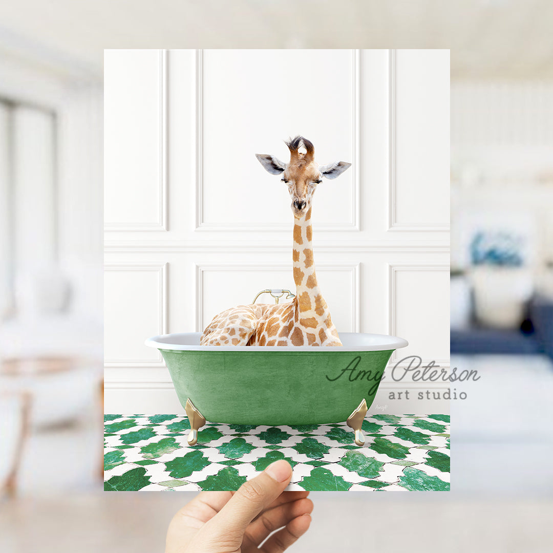 a hand holding up a card with a giraffe in a bathtub