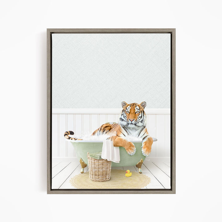 A tiger is sitting in a green bathtub, surrounded by a basket of toys and a yellow rubber duck, creating a whimsical and playful scene.