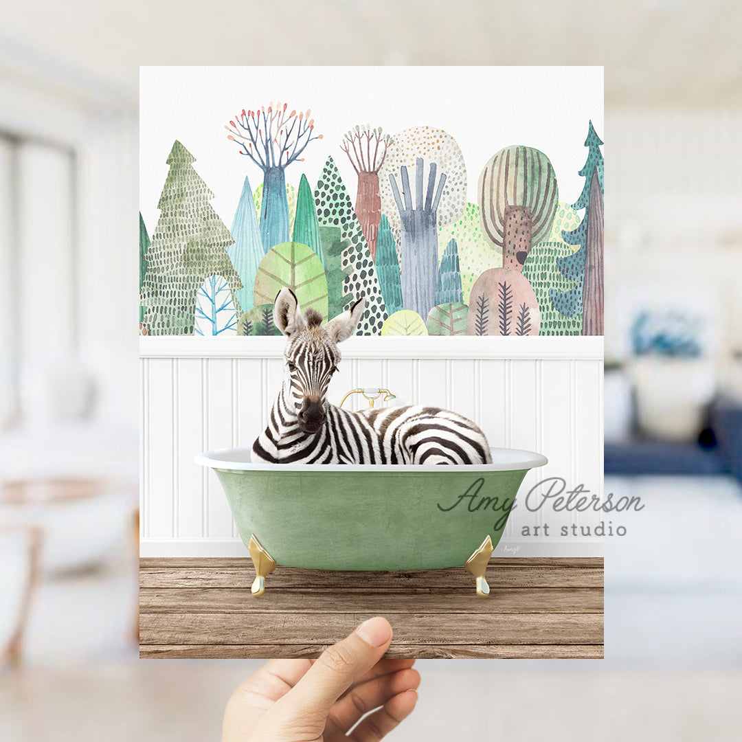 a hand holding up a card with a zebra in a bathtub