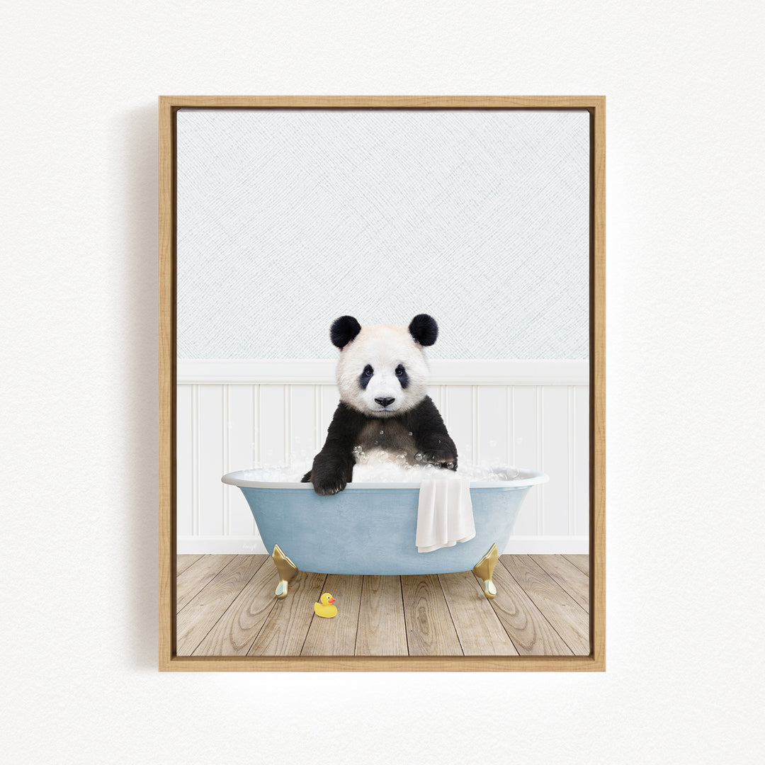A panda bear sitting in a blue bathtub filled with bubbles, surrounded by a white background.