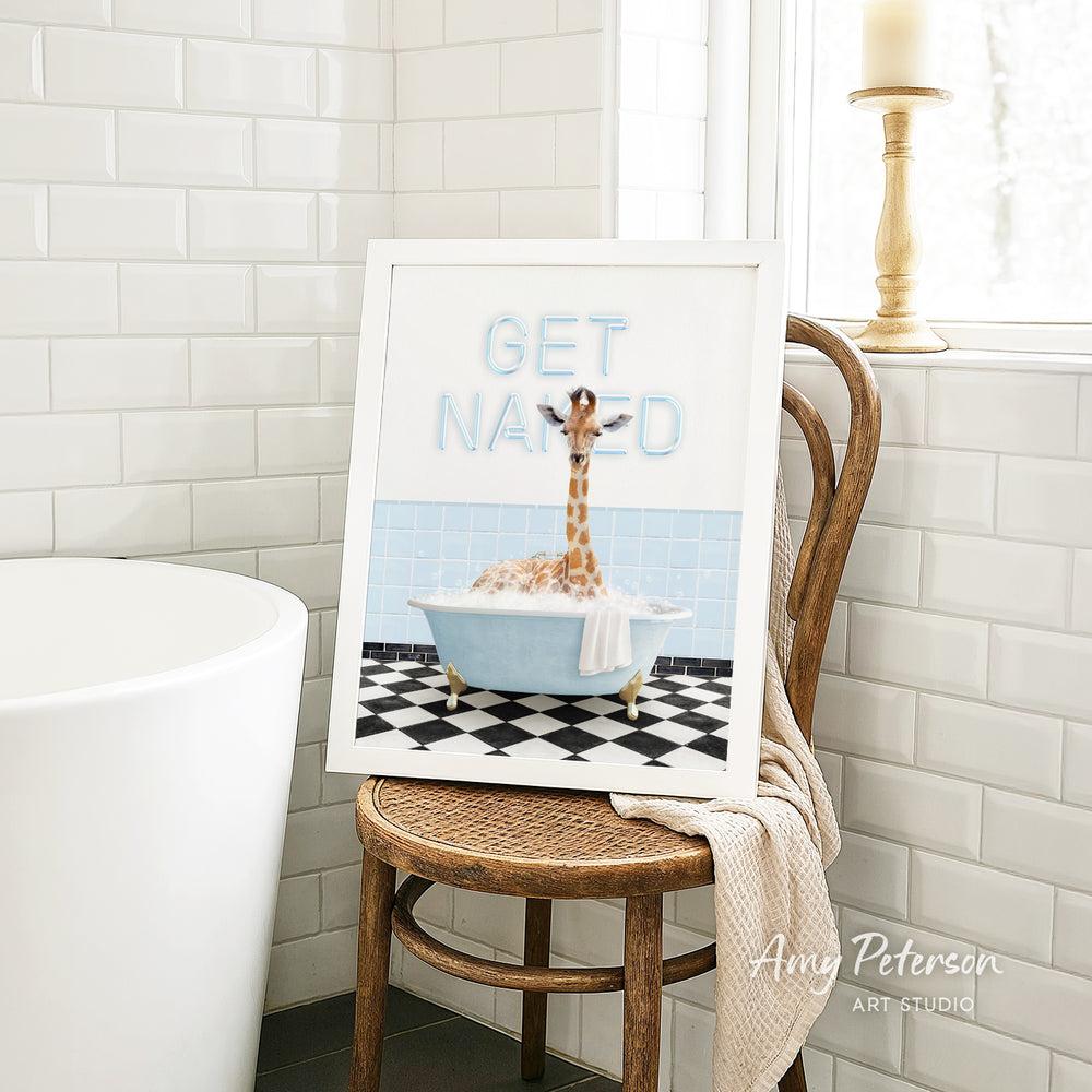 A framed image of a giraffe sitting in a bathtub, with the text "GET NAMED" displayed on the frame.