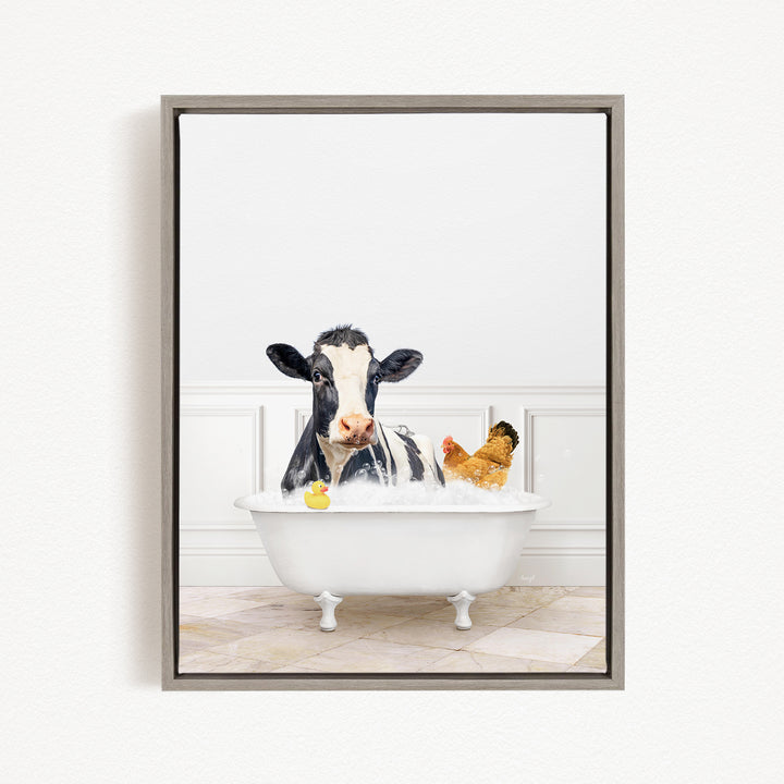 A black and white cow is sitting in a white bathtub, surrounded by a yellow rubber duck and a chicken, creating a whimsical and playful scene.