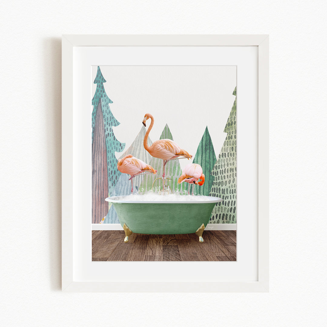 A framed image depicting three pink flamingos standing on a green bathtub, with a backdrop of stylized trees and a white wall.