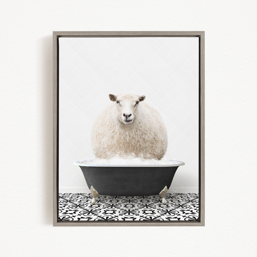 A fluffy white sheep sits in a black bathtub filled with bubbles, creating a whimsical and playful scene.