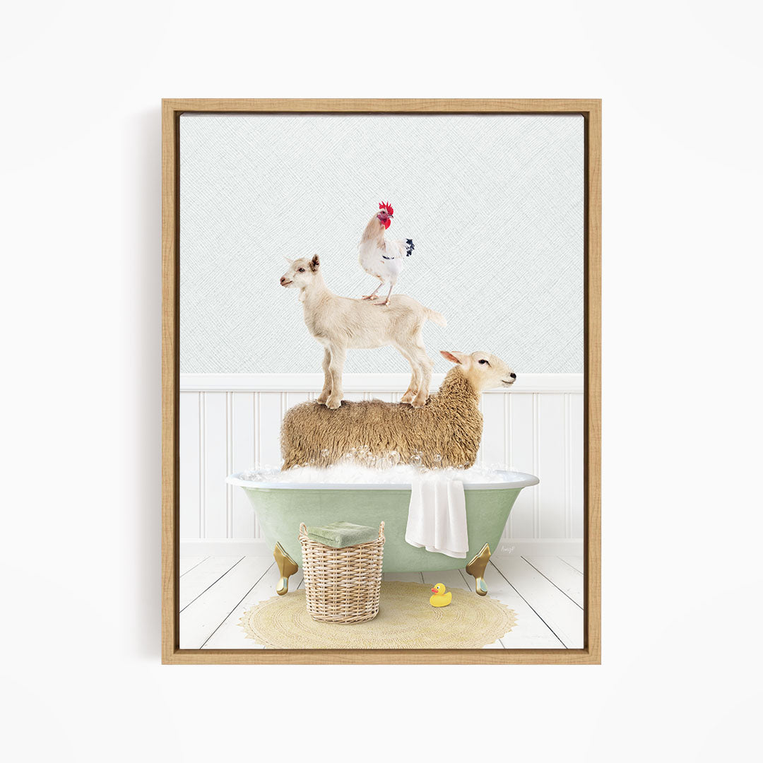 A framed image depicting a sheep standing on a tub filled with water, with a chicken perched on top of it, and a lamb sitting on the edge of the tub.