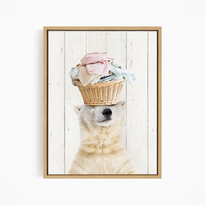 A polar bear balancing a basket of clothes on its head.