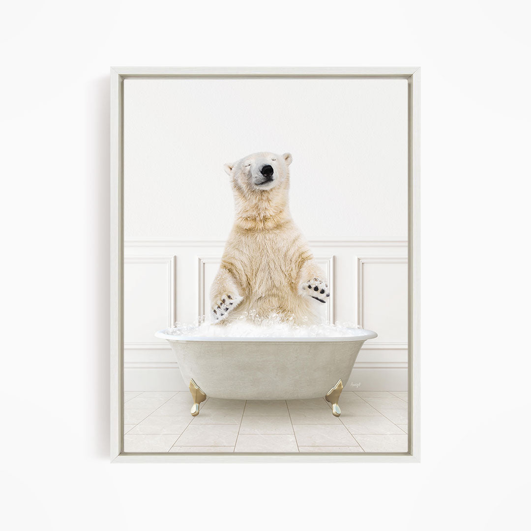 A polar bear standing in a white bathtub filled with water, appearing to be enjoying a bath.