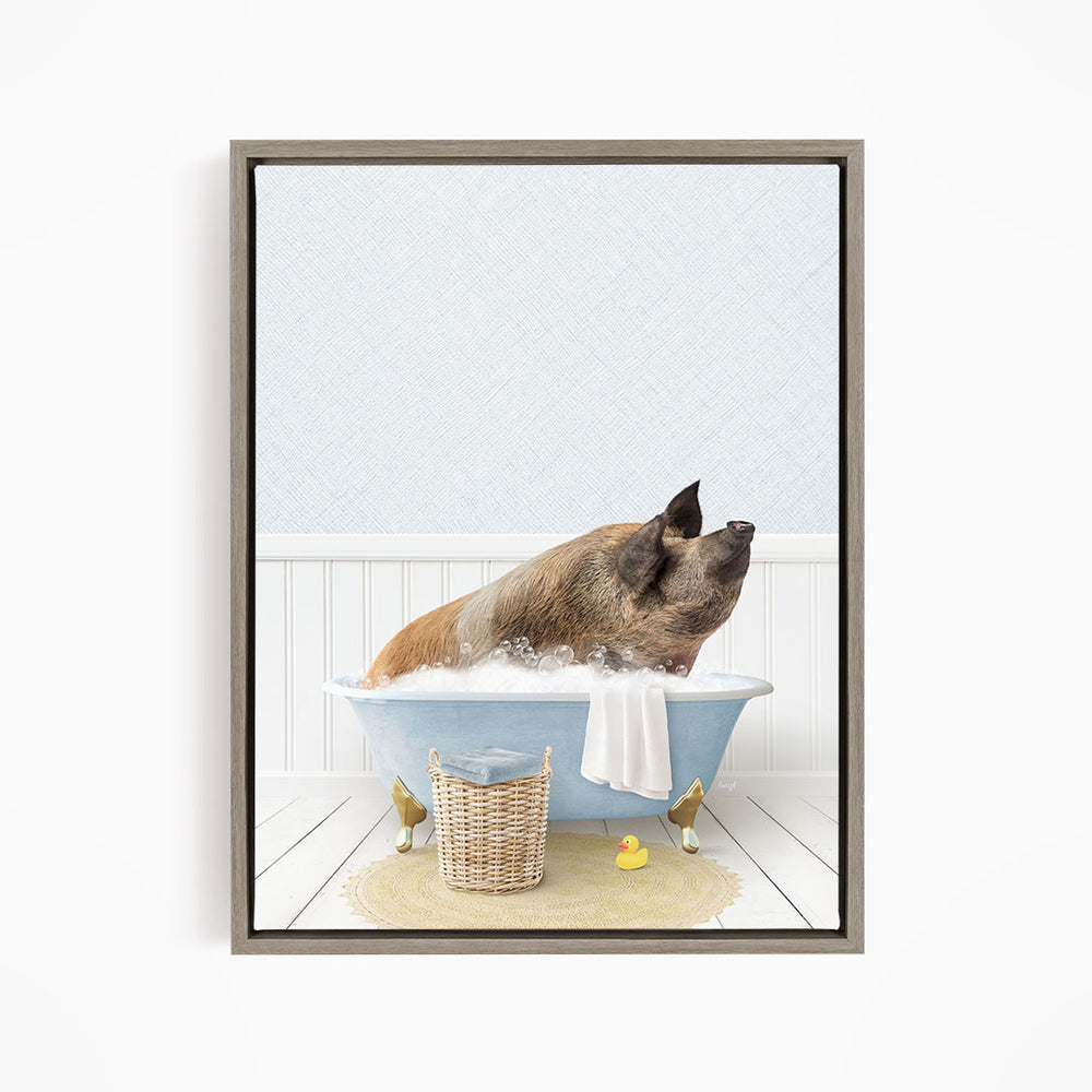 A brown dog is sitting in a blue bathtub filled with water, surrounded by rubber ducks and a towel.