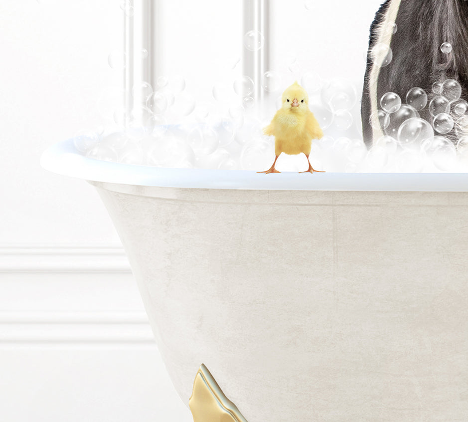 a bathtub with bubbles and a rubber duck in it