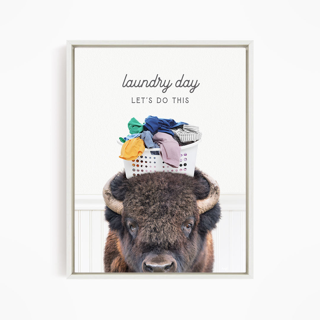 A buffalo with a laundry basket on its head, accompanied by the text "laundry day let's do this".