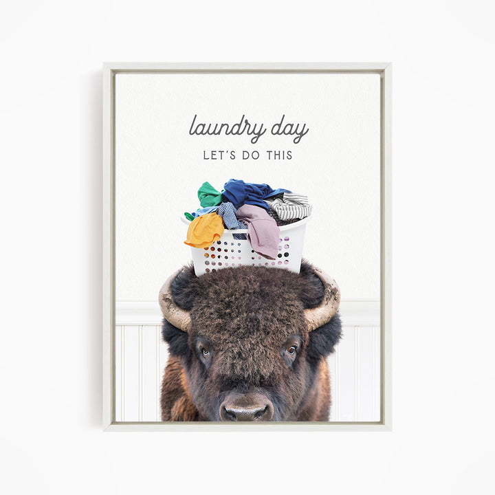 A buffalo with a laundry basket on its head, accompanied by the text "laundry day let's do this".
