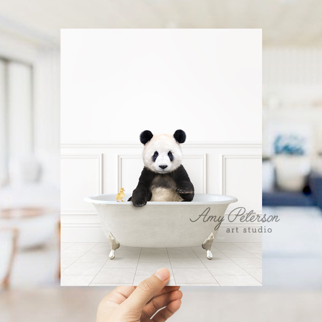 a panda bear sitting in a bath tub