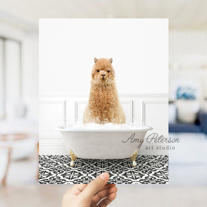 a hand holding a card with a dog in a bathtub