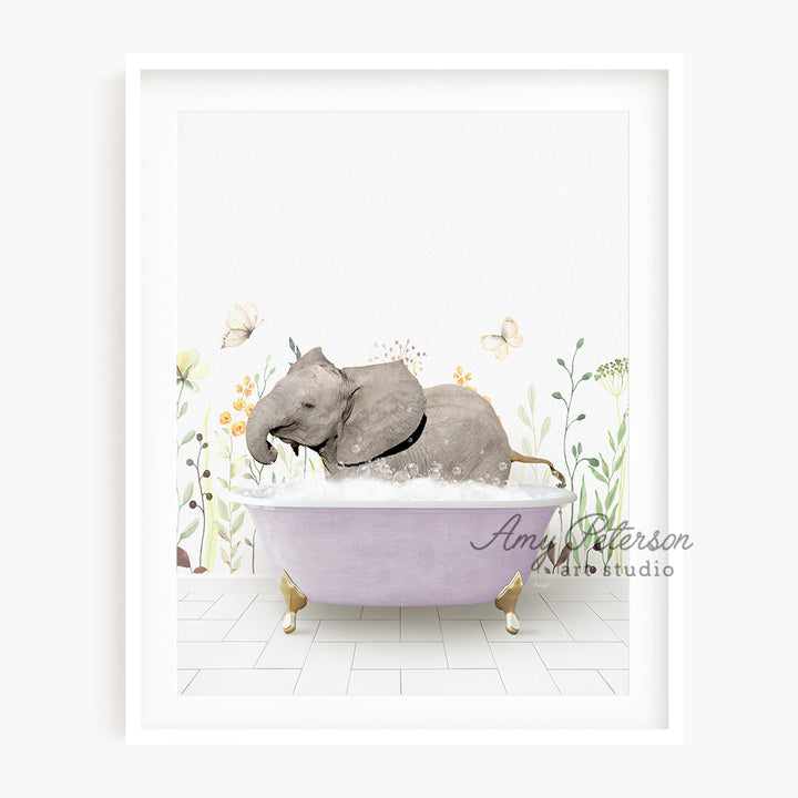 a picture of an elephant taking a bath