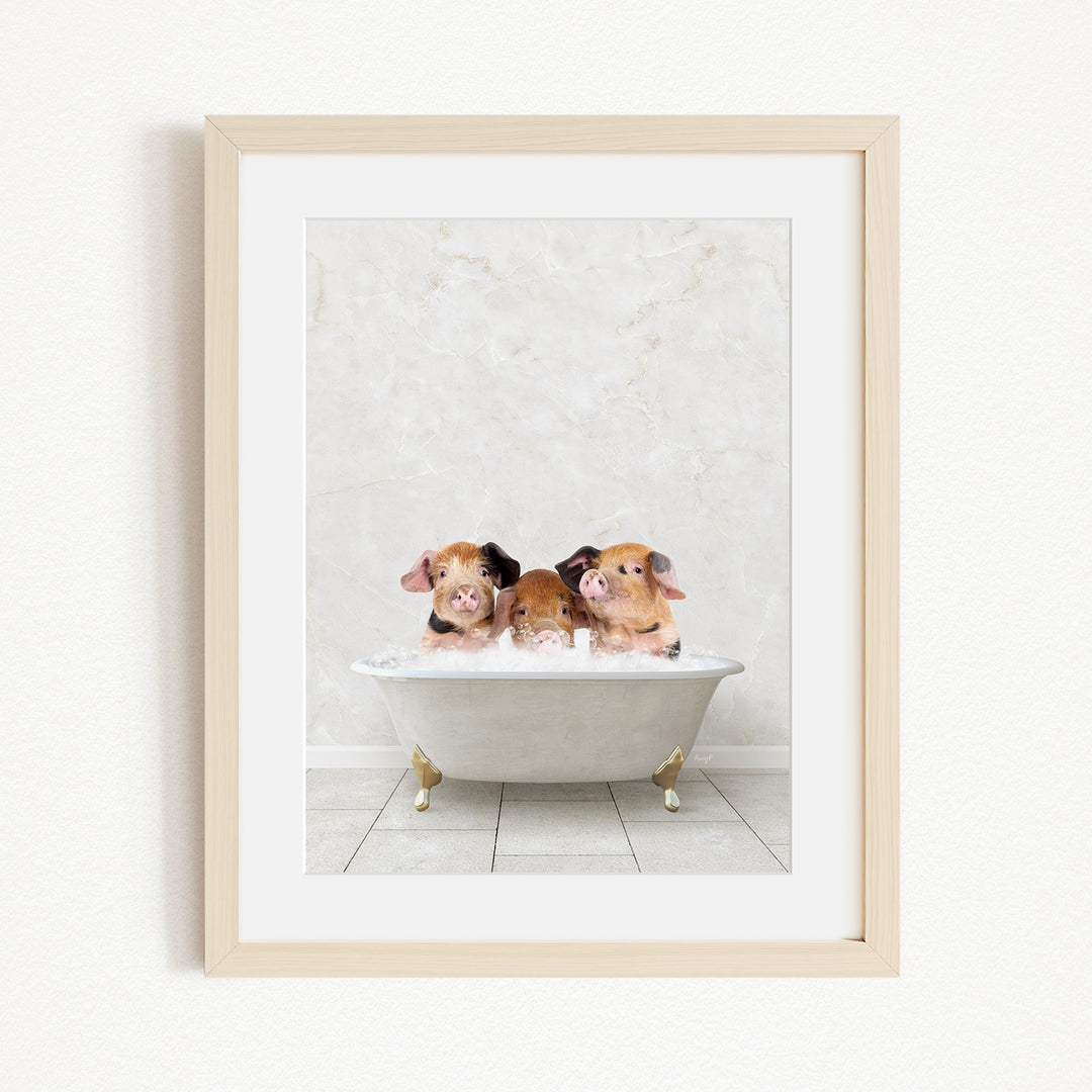 Three adorable pigs sitting in a white bathtub, enjoying a relaxing bath.