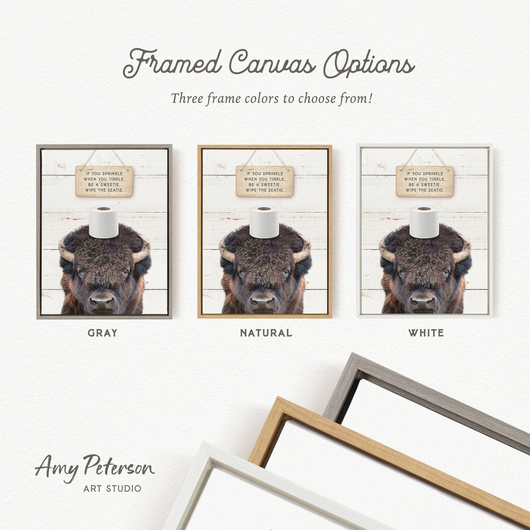 The image is a framed canvas with three different color options for the frame, including gray, natural, and white. The canvas features a picture of a bison with a sign that reads "If you sprinkle when you sneeze, when you cough, when you sneeze, you're a good sport."