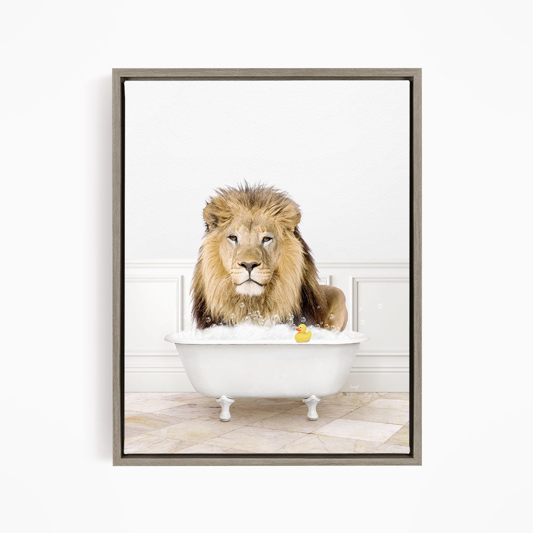 A lion sitting in a white bathtub, surrounded by a yellow rubber duck.